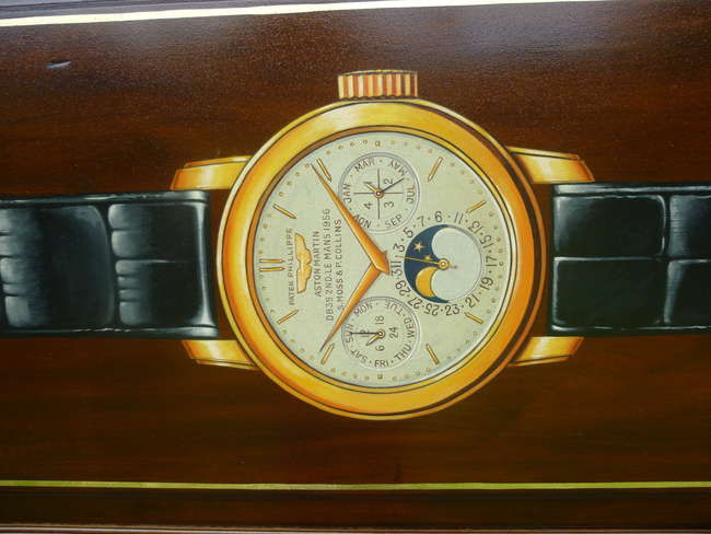 Aston Martin Le Mans themed Watch advertising board.-Auction Lot