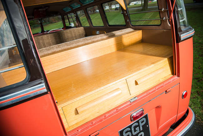 Orange Vintage Volkswagen Type 2 Transporter Kombi Or Microbus Driving On Road Image475145033