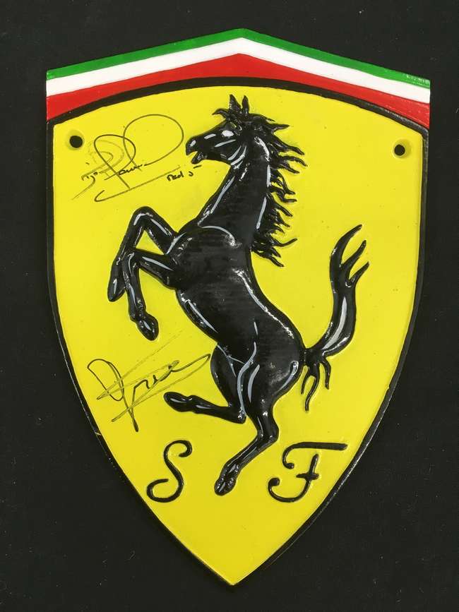 Ferrari metal shield.-Sold