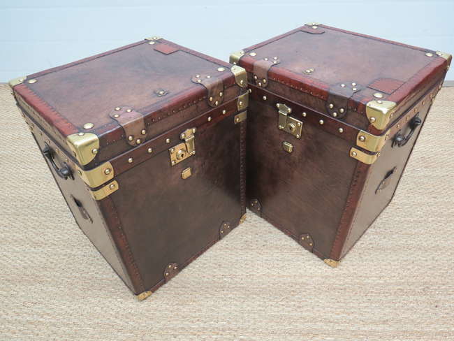 A pair of Army and Navy leather travel trunks-Sold
