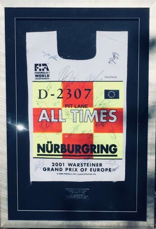 Framed and signed F1 tabard - 2001 Grand Prix of Europe-Sold