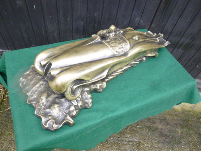 Cold cast brass, Art Deco styled Jaguar XK120 sculpture.-Sold