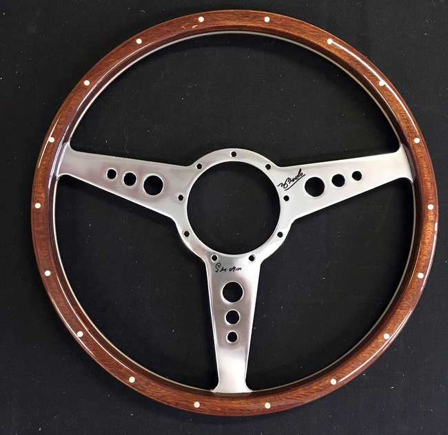 Steering wheel, signed Sir Stirling Moss and Tony Brooks-Sold