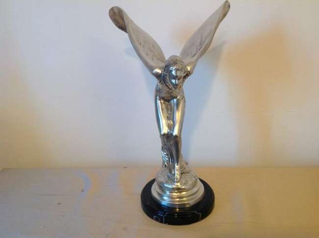Spirit of Ecstasy.-Sold