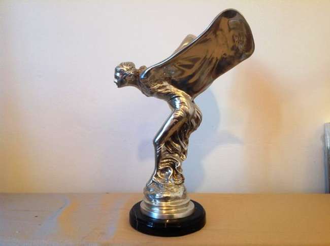 Spirit of Ecstasy.-Sold