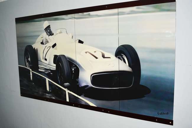 Sir Stirling Moss OBE 4-panel display -Auction Lot