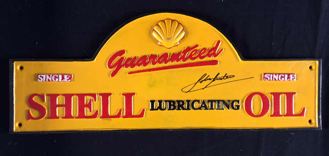 Metal Shell Oil sign, signed by John Surtees CBE-Sold