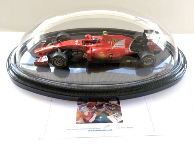 Domed Ferrari model, signed Kimi Raikkonen-Sold