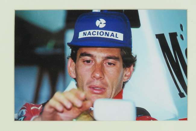 Ayrton Senna autograph in photographic montage-Sold
