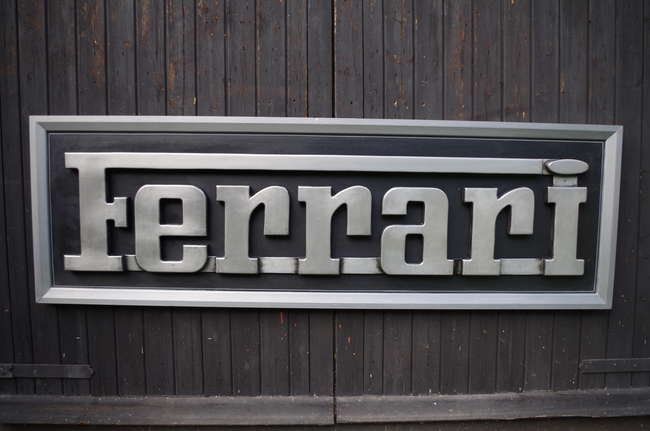 Cold-cast aluminium Ferrari wall sign.-Sold