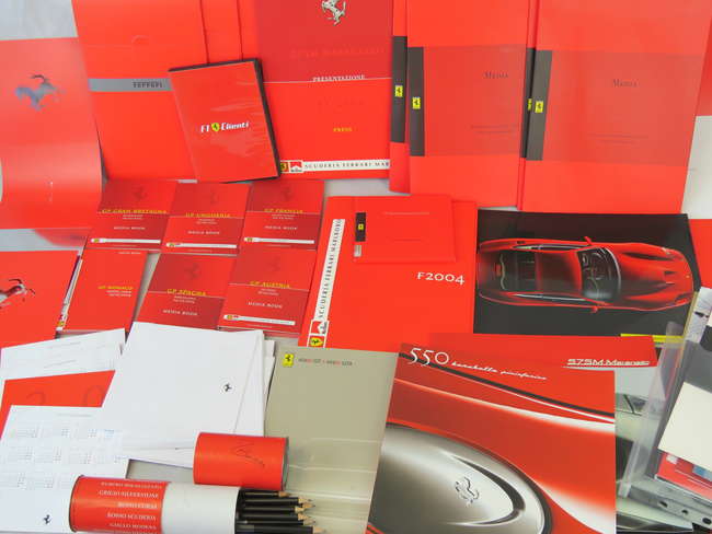 Ferrari press packs, media books, and more.-Sold
