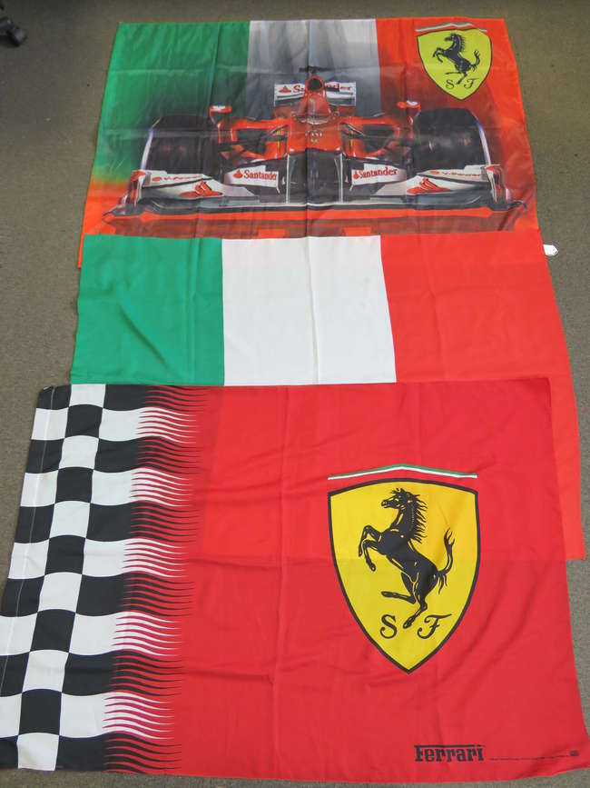 Two Official Ferrari flags and an Italian flag.-Sold