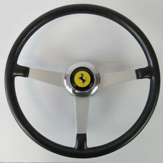 Original Momo three-spoke steering wheel.-Auction Lot