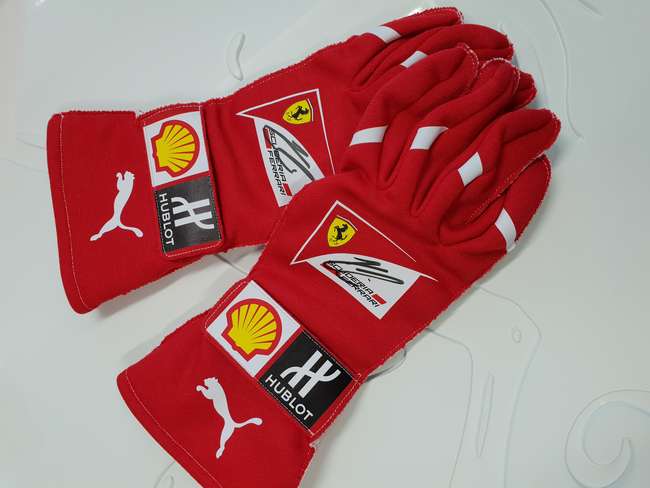Signed Kimi Raikkonen gloves-Sold