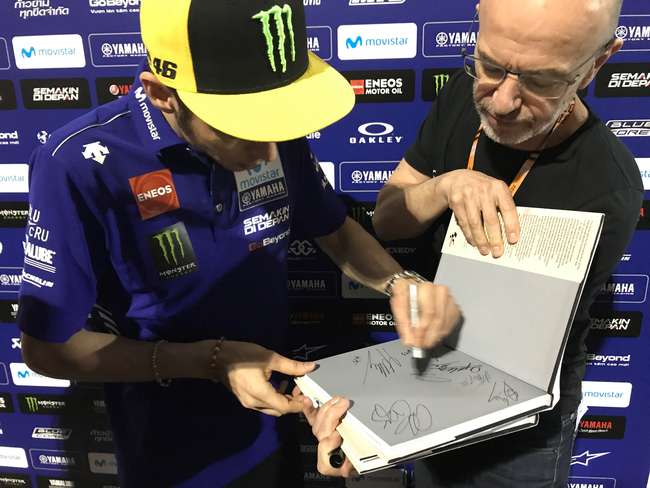 The first of two specially signed Moto GP hardback books-Sold