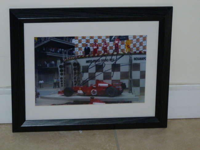 Michael Schumacher signed photograph.-Sold