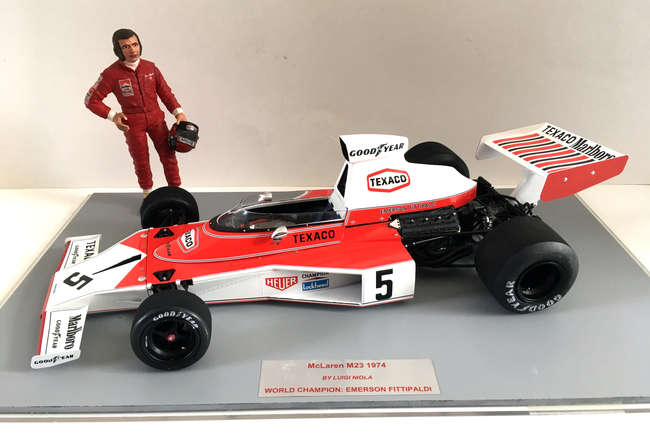 1/12 McLaren M23, signed by Emerson Fittipaldi Diorama-Auction Lot