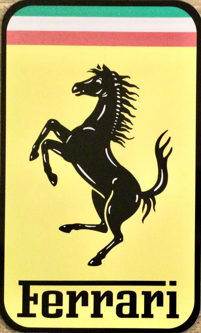 A large metal Ferrari-themed wall sign-Sold