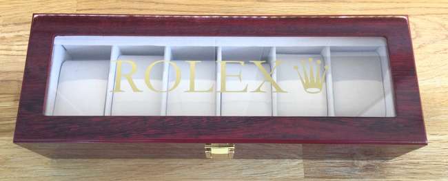 A Superb Rolex Six-Watch Display Case in Cherry Wood-Sold