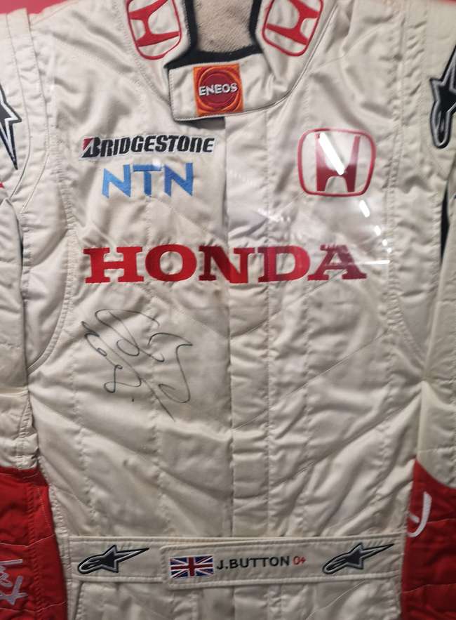 Jenson Button's 2007 Honda Racing Team Race Suit -Auction Lot