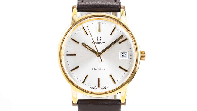 Omega Geneve Gold Plated manual wind, with silver dial.  -Sold