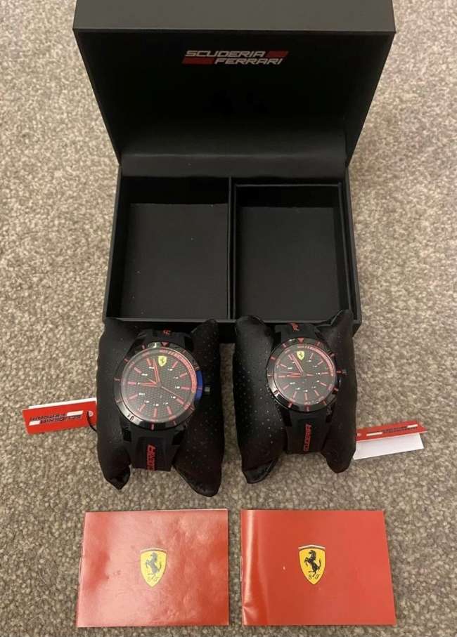 A rare boxed pair of 'His & Hers' Scuderia Ferrari Sports wa-Sold