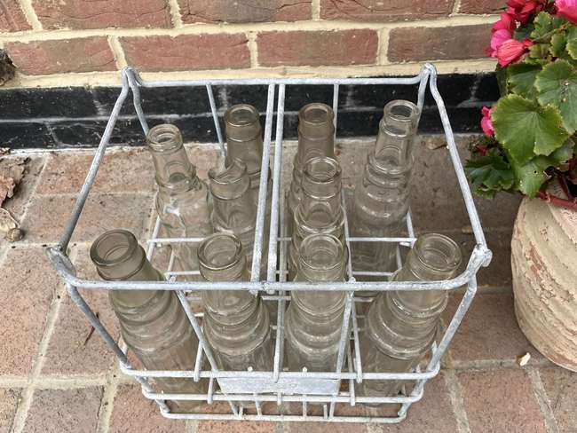 Selection of Esso Oil Bottles and Period Correct Crate -Auction Lot
