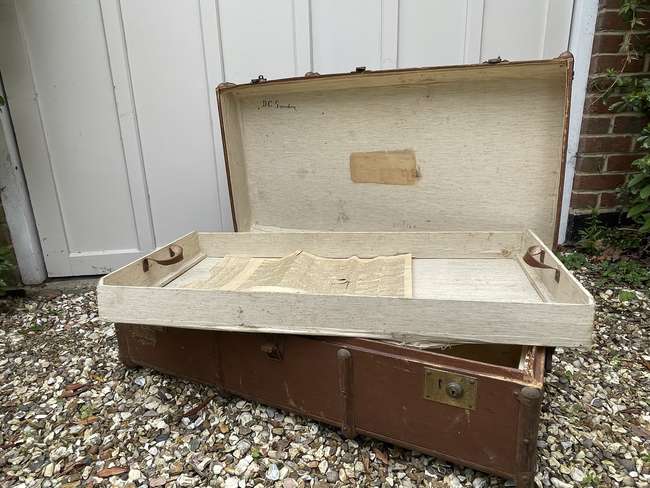 Selection of Four Well-Travelled Suitcases-Auction Lot