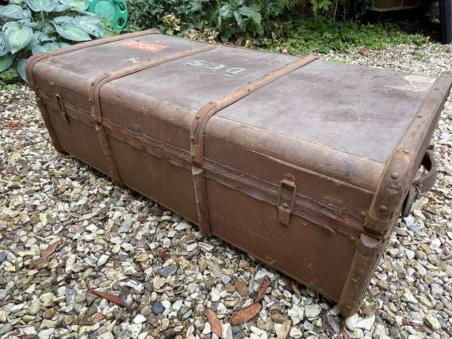 Selection of Four Well-Travelled Suitcases-Auction Lot