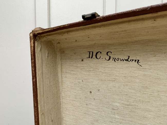 Selection of Four Well-Travelled Suitcases-Auction Lot