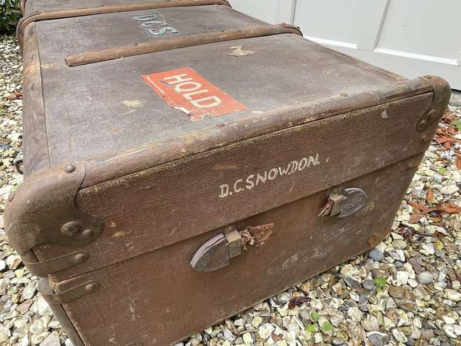 Selection of Four Well-Travelled Suitcases-Auction Lot