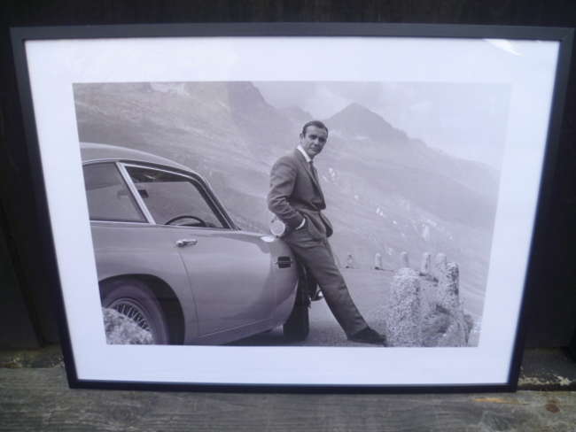 A Pair of Framed Prints depicting Sean Connery as 007 in 'Go-Sold