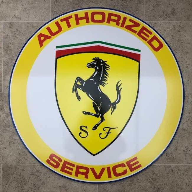 A Contemporary 'Authorised Service' Ferrari-Themed Roundel S-Sold