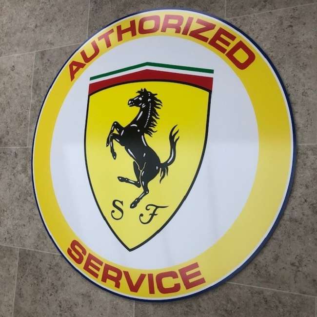 A Contemporary 'Authorised Service' Ferrari-Themed Roundel S-Sold