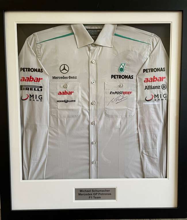 Michael Schumacher-signed Mercedes Petronas F1 Team Shirt -Sold