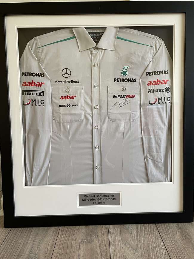 Michael Schumacher-signed Mercedes Petronas F1 Team Shirt -Sold