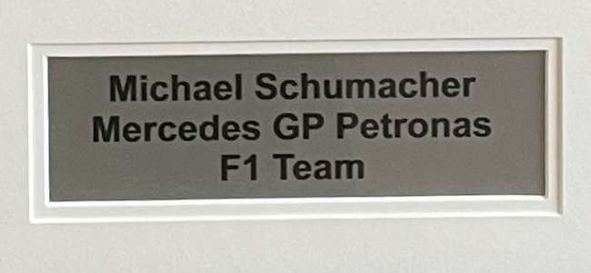 Michael Schumacher-signed Mercedes Petronas F1 Team Shirt -Sold