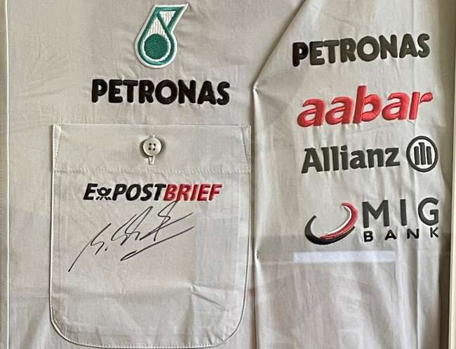 Michael Schumacher-signed Mercedes Petronas F1 Team Shirt -Sold