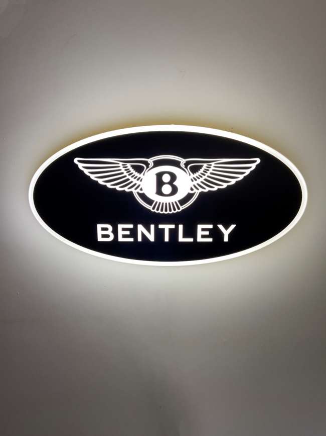 An Oval Lightbox Displaying the 'Bentley' logo-Sold