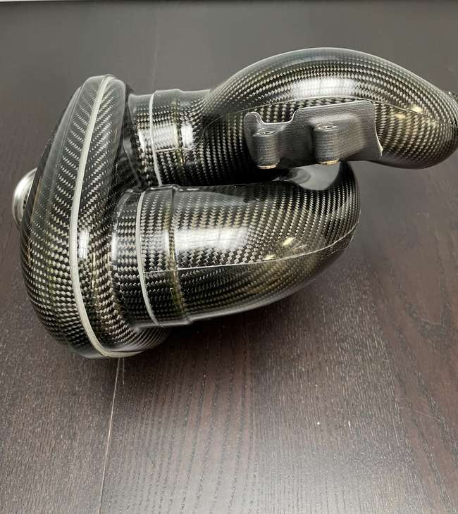 A Pair of Mercedes-AMG ONE Prototype Carbonfibre Intake Mani-Auction Lot