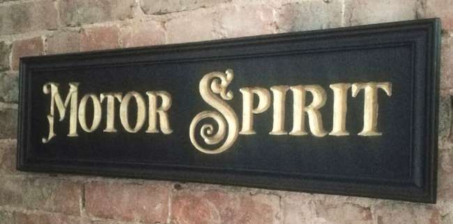 A Beautiful Hand-Carved Wooden 'Motor Spirit' Wall Sign -Sold