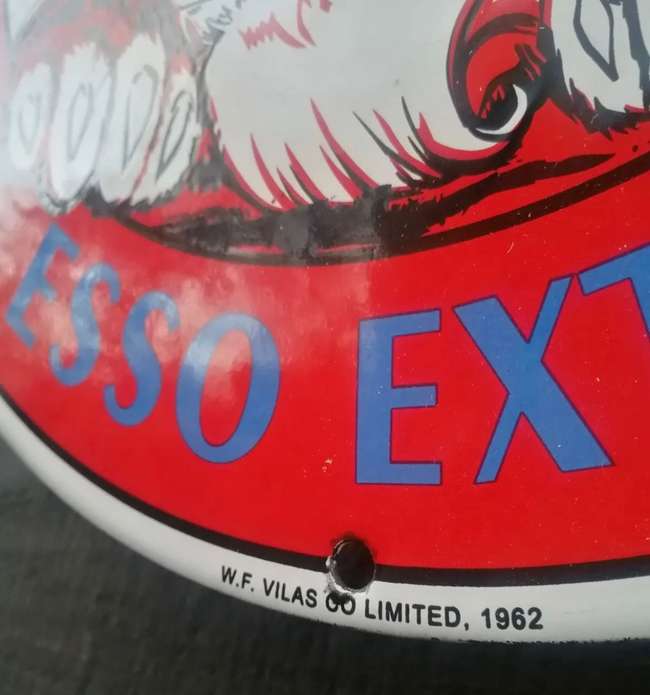 A New/Old Stock Enamelled Metal Esso Rounded Sign