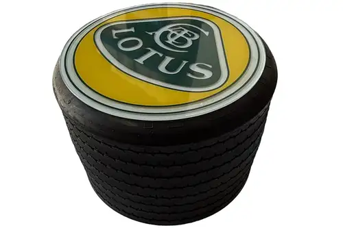 An F1 Rear Tyre Topped with a Toughened Glass Lotus Motif-For Sale
