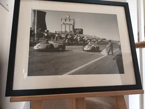 Multi-Signed Monochrome Image of Sir Stirling Moss Winning t-For Sale