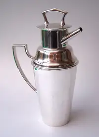 A Superb Art Deco Silver Plated Asprey Cocktail Shaker and Silver Plated Asprey Cocktail Bar Set