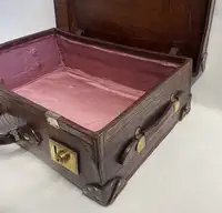 A Large Crocodile Skin Suitcase/Trunk Bearing the Initials  A.C.G.