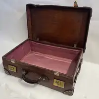 A Large Crocodile Skin Suitcase/Trunk Bearing the Initials  A.C.G.