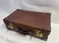 A Large Crocodile Skin Suitcase/Trunk Bearing the Initials  A.C.G.