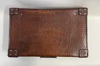 A Large Crocodile Skin Suitcase/Trunk Bearing the Initials  A.C.G.