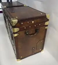 A Pair of Substantial Army and Navy Steamer Trunks-Sold
